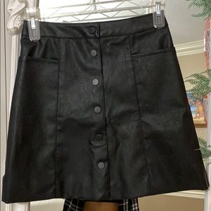 Black leather mini skirt
